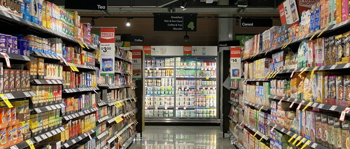African retail supermarket aisle with stocked shelves
