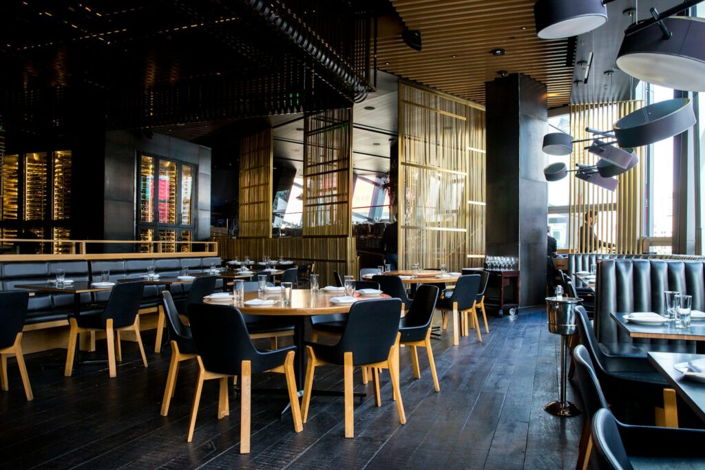Modern restaurant interior with set tables